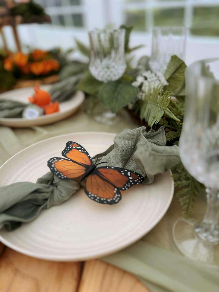 Styled event table with place settings and decorative details for a private celerbration