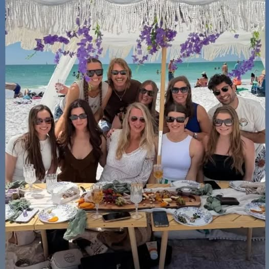 Outdoor social celebration featuring a beautifully decorated table for a gathering of friends in Sarasota.
