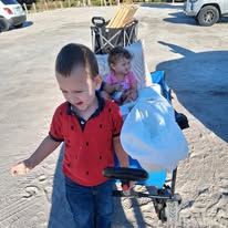 Miranda's two young children together during the early years of her family-run event planning bussiness